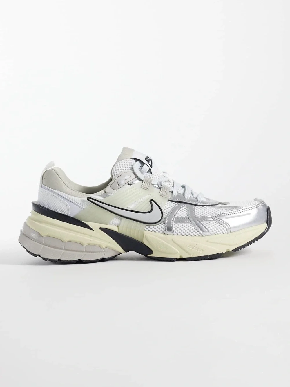 Nike Women’s Silver White and Black Retro Runner Sneakers